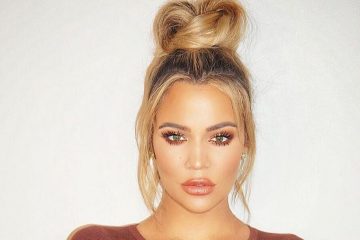 Khloe Kardashian accidentally shows off BABY BUMP at Airport?