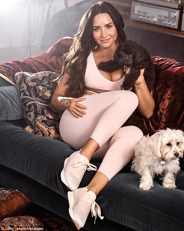 Her own best advert! Demi Lovato shows off her fit figure as she models bra and leggings for her collaboration with Kate Hudson’s Fabletics brand